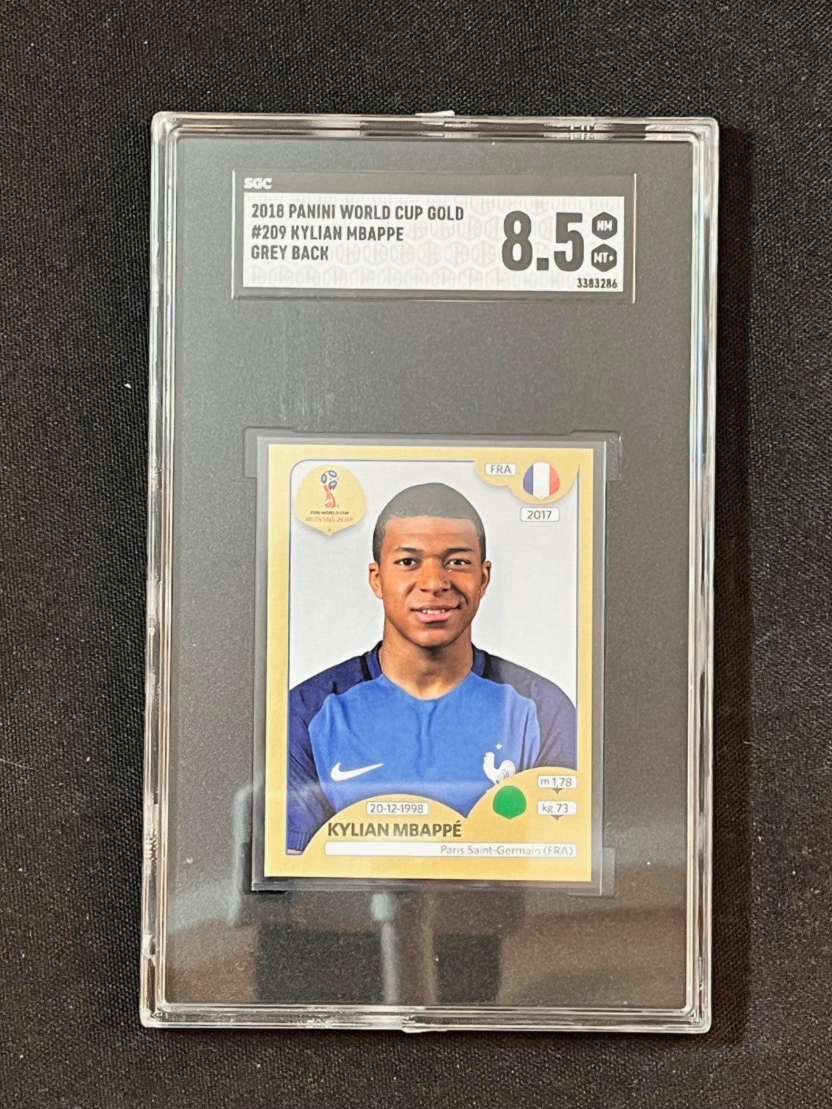 2018 Panini World Cup Gold Kylian Mbappé #209 Grey Back Sticker – SGC 8.5 - slab front